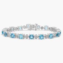 Blue And White Topaz Flower Bracelet In Sterling Silver