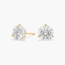 Beautifully matched, these stud earrings feature round lab-grown diamonds for a total of 6 carats, set in 14k yellow gold four-p