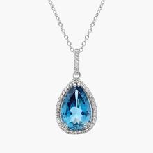 London Blue Topaz Elegant Halo Pendant In Sterling Silver (14x9mm)